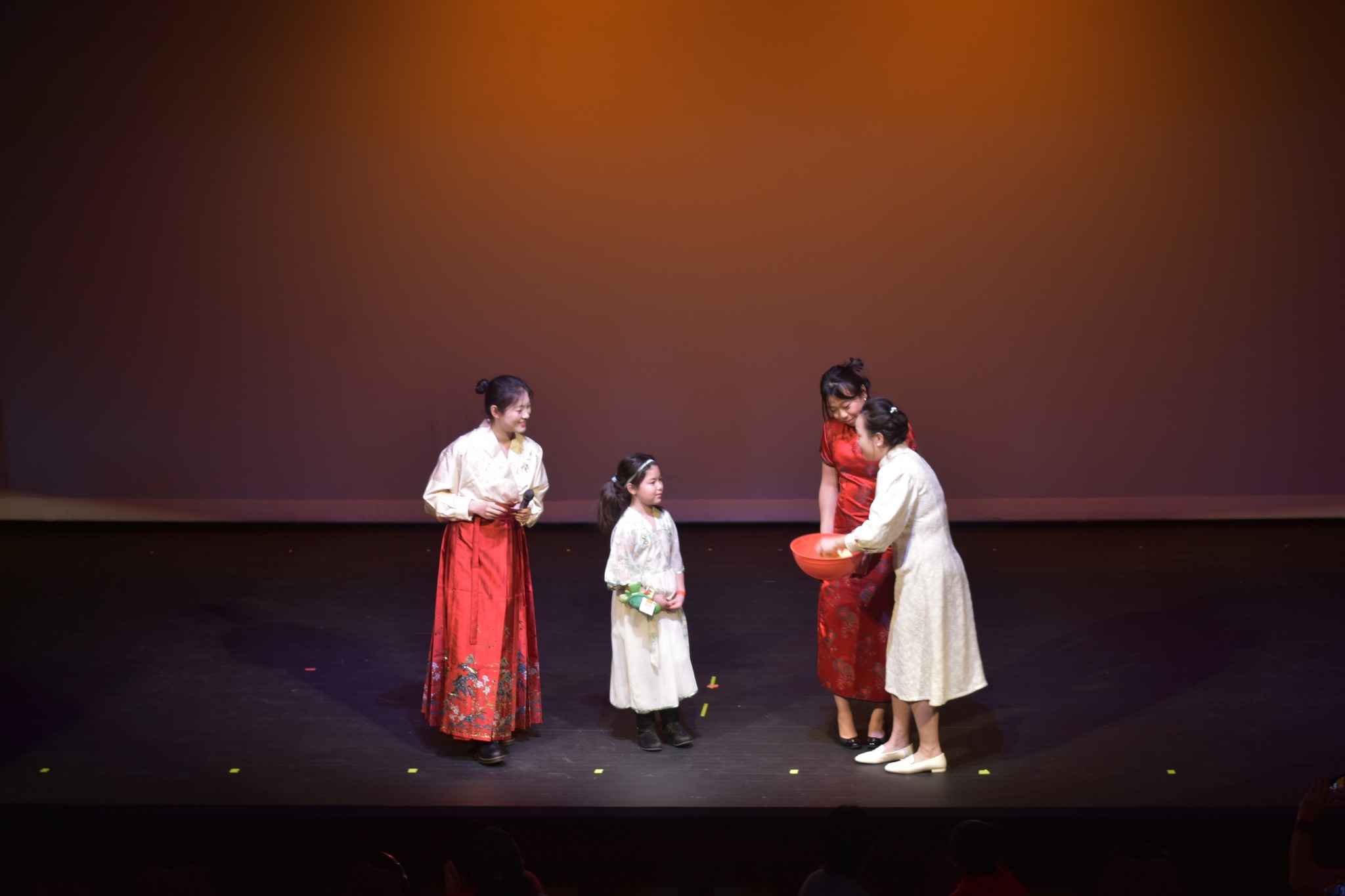 Stage moment with gift